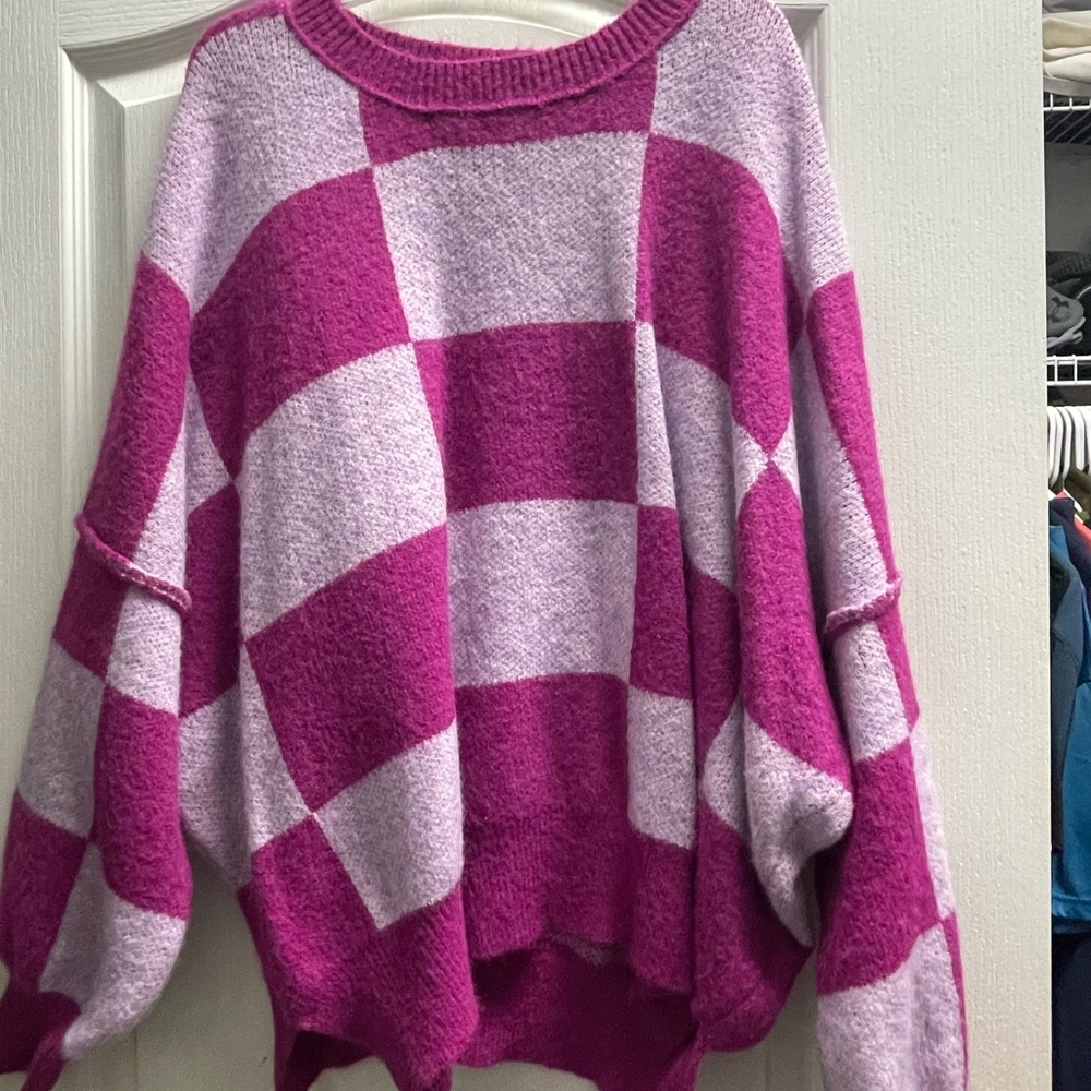 Super cute boutique brand sweater. Very soft and fluffy!  Excellent condition.
